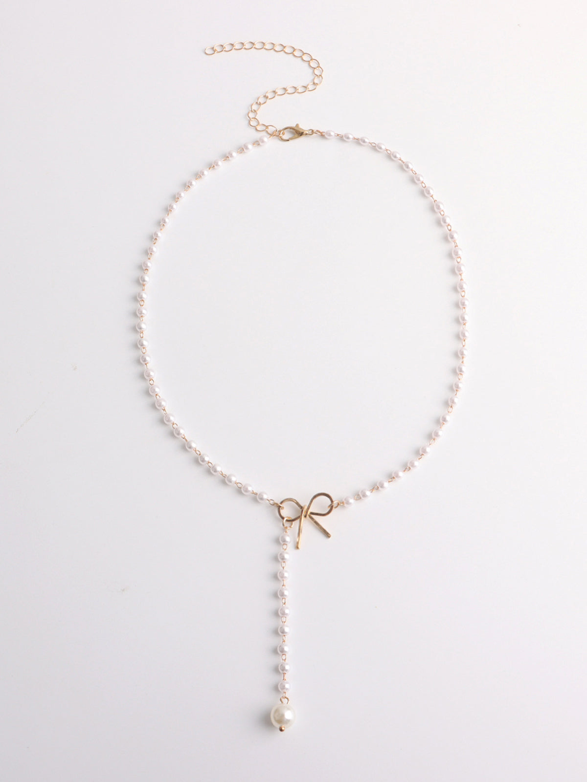 Collier pendentif nœud en perle
