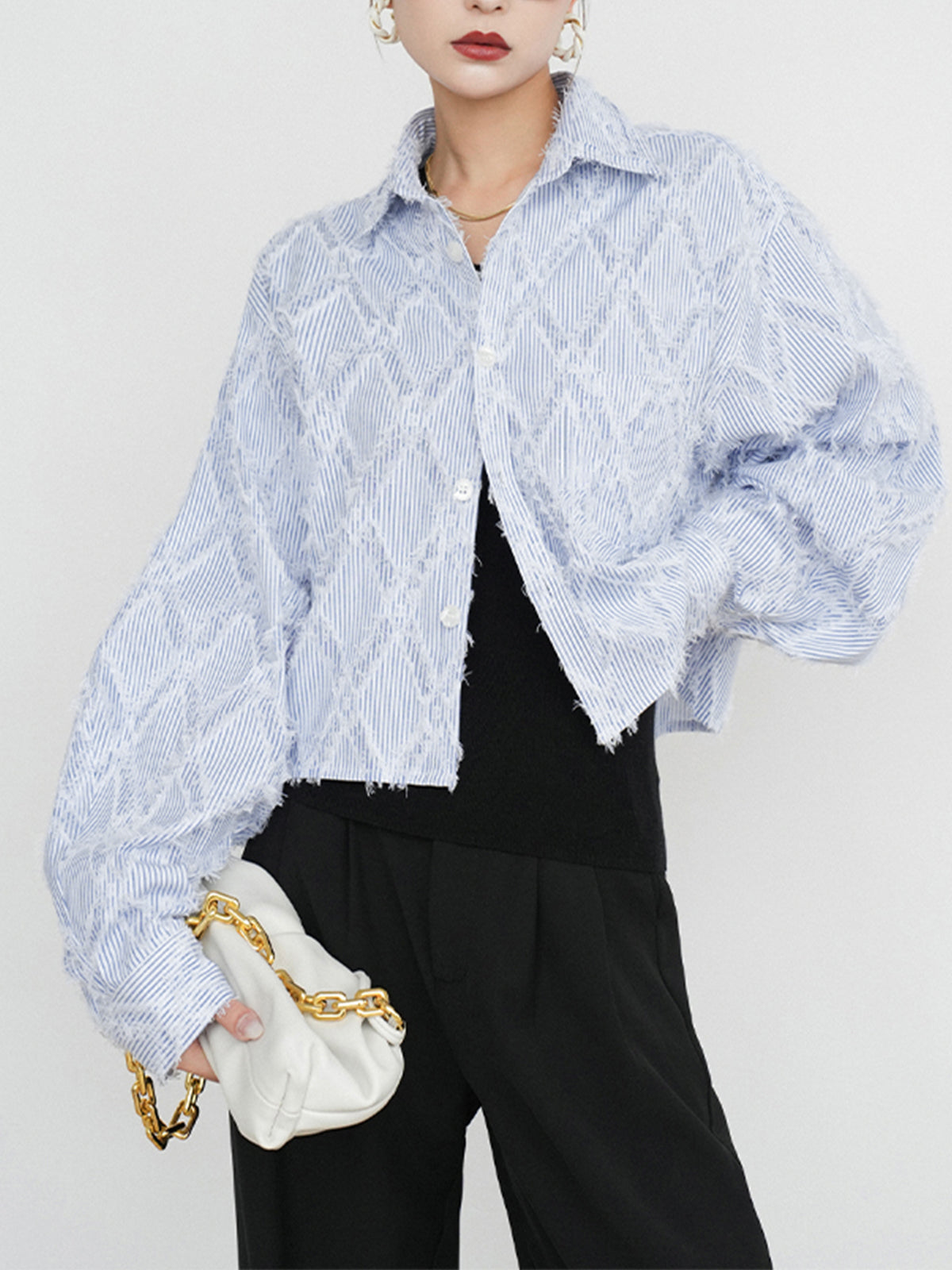 Motif en diamant avec chemise à ligne à pompon